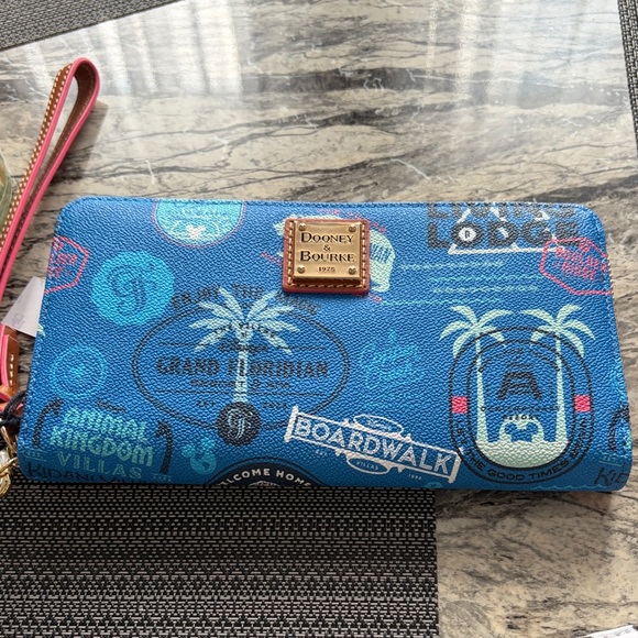 Dooney & Bourke Handbags - Dooney & Bourke Disney vacation Graphic wallet/ Wristlet